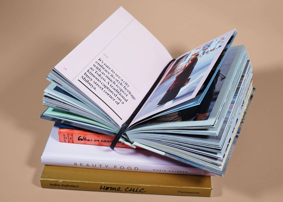 128 g/m² 140 g/m² 157 g/m² Livro de capa dura de luxo impressão arte mesa de centro fotolivro